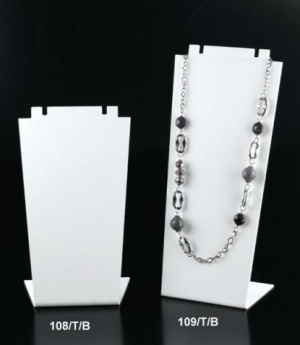 White plexiglass necklace display