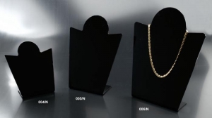 Black plexiglass necklace display