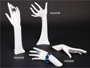Glossy-white plastic ring/glove/bracelet display hand
